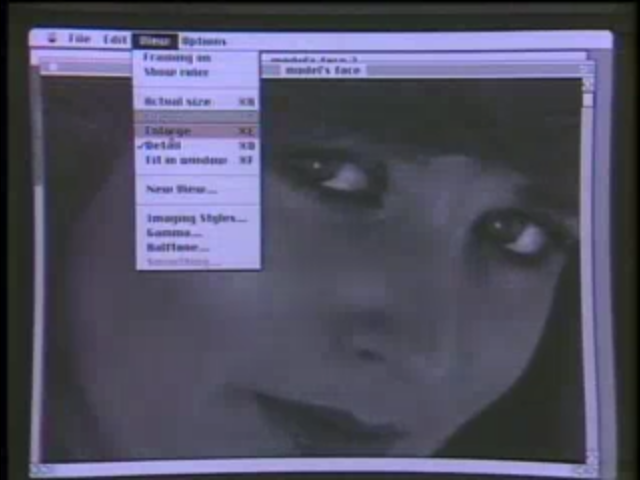 A screenshot from a demonstration of “MacImage,” showing an image of a woman’s face in the main window. There is also a traditional Macintosh-style menu on the top with one of the sub-menus selected.