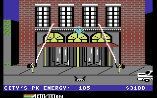 Screenshot from &ldquo;Ghostbusters&rdquo; for the Commodore 64 by David Crane, featuring two ghostbusters trying to catch a ghost in front of a building.