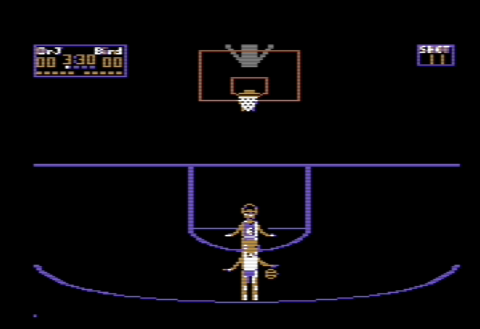 An in-game screenshot from Electronic Arts' One-on-One Basketball, featuring Larry Bird dribbling a ball past Julius “Dr. J” Erving.